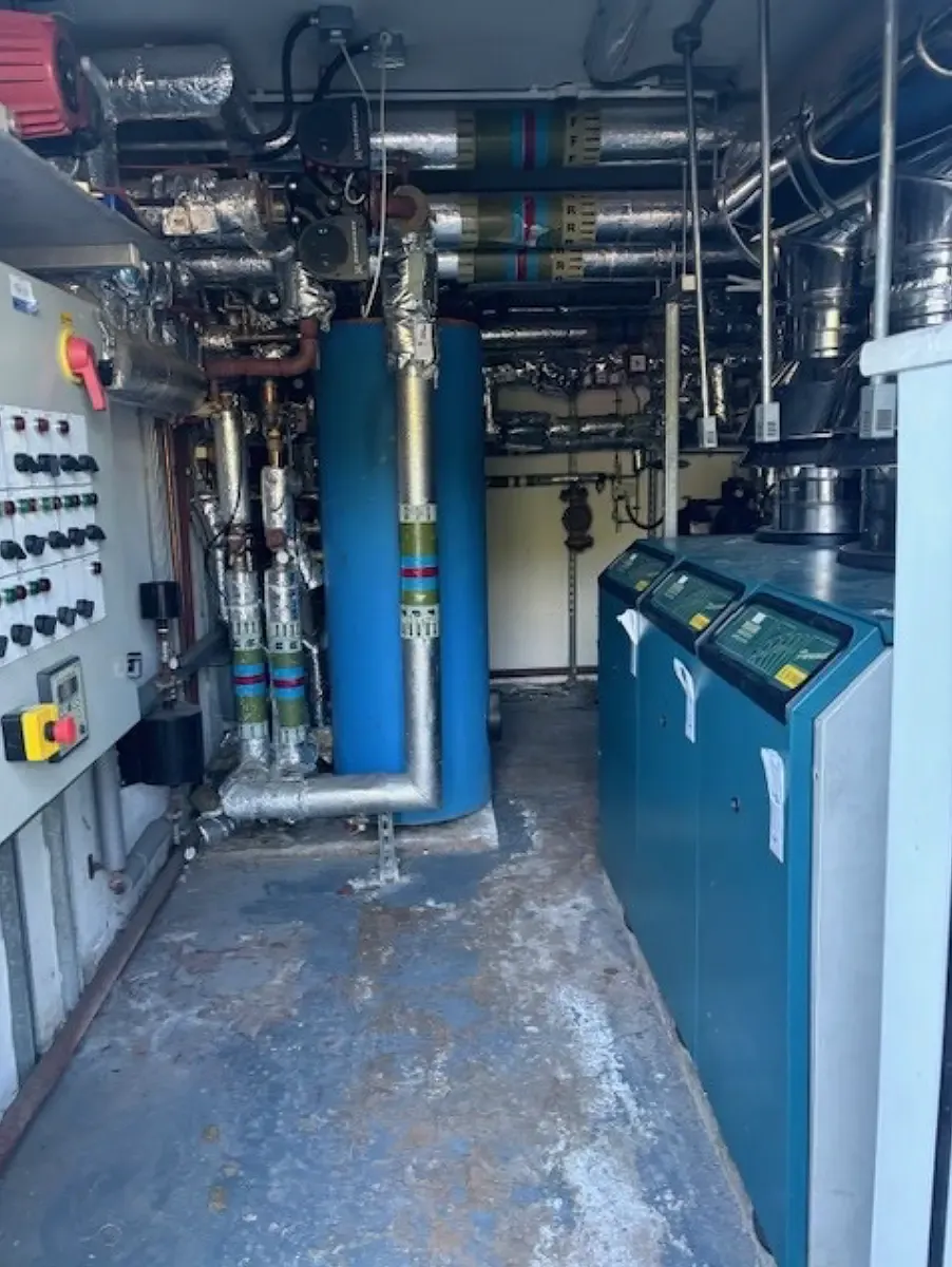 the old out-of-date heating system at Eric Long Court